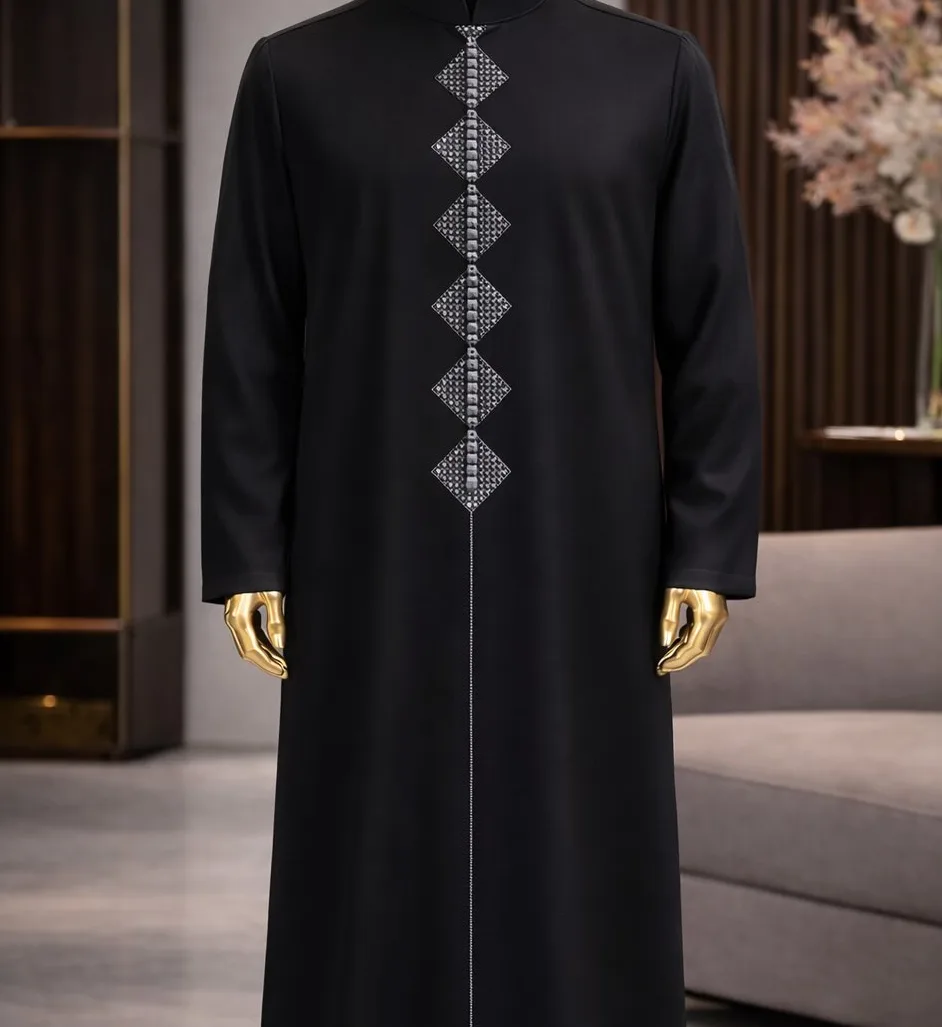 A midnight thobe with a diamond-stitched placket